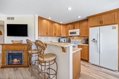 Dramatic lake, fairway and views of the Santa Rosa Mountains on Palm Royale Country Club in California - for sale on GolfHomes.com, golf home, golf lot