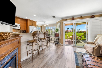 Dramatic lake, fairway and views of the Santa Rosa Mountains on Palm Royale Country Club in California - for sale on GolfHomes.com, golf home, golf lot