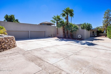 Located in the heart of the golf course area, this stunning on London Bridge Golf Course in Arizona - for sale on GolfHomes.com, golf home, golf lot
