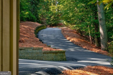 Imagine a walk to remember down a meandering driveway, leading on Chattahoochee Golf Course in Georgia - for sale on GolfHomes.com, golf home, golf lot