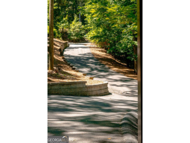 Imagine a walk to remember down a meandering driveway, leading on Chattahoochee Golf Course in Georgia - for sale on GolfHomes.com, golf home, golf lot