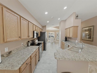 Located in the gated 55+ golf community of Heritage Pines, this on Heritage Pines Country Club in Florida - for sale on GolfHomes.com, golf home, golf lot