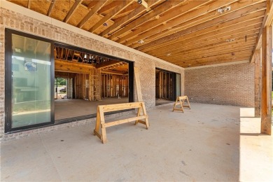 Discover refined luxury in this impeccably designed ranch estate on Manor Golf and Country Club in Georgia - for sale on GolfHomes.com, golf home, golf lot