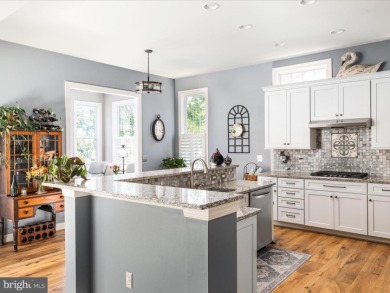 Welcome to 15455 Championship Drive, a stunning and meticulously on Regency At Dominion Valley Country Club in Virginia - for sale on GolfHomes.com, golf home, golf lot