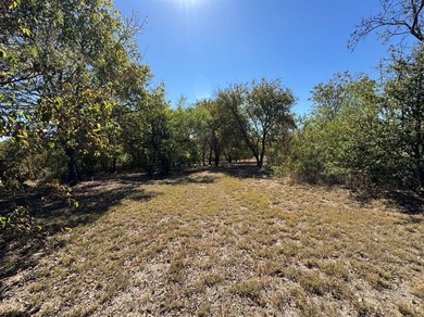 Build your dream home on this prime 1.54-acre homesite in the on Tangle Ridge Golf Club in Texas - for sale on GolfHomes.com, golf home, golf lot
