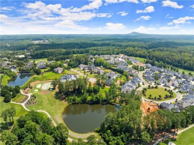 Discover refined luxury in this impeccably designed ranch estate on Manor Golf and Country Club in Georgia - for sale on GolfHomes.com, golf home, golf lot