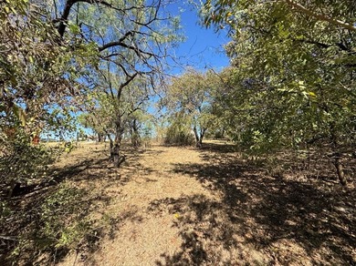 Build your dream home on this prime 1.54-acre homesite in the on Tangle Ridge Golf Club in Texas - for sale on GolfHomes.com, golf home, golf lot