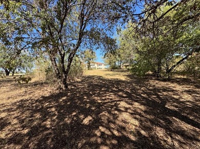 Build your dream home on this prime 1.54-acre homesite in the on Tangle Ridge Golf Club in Texas - for sale on GolfHomes.com, golf home, golf lot