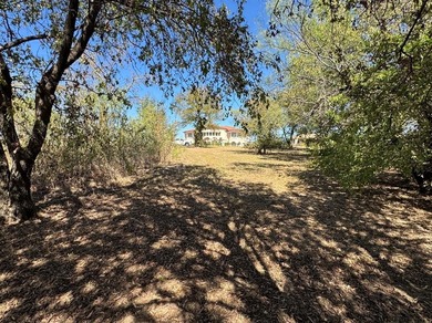 Build your dream home on this prime 1.54-acre homesite in the on Tangle Ridge Golf Club in Texas - for sale on GolfHomes.com, golf home, golf lot