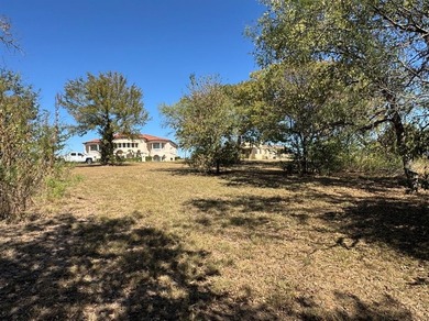 Build your dream home on this prime 1.54-acre homesite in the on Tangle Ridge Golf Club in Texas - for sale on GolfHomes.com, golf home, golf lot