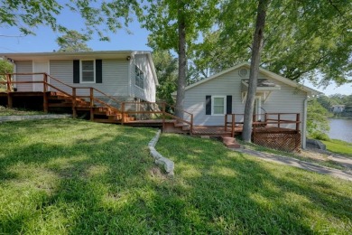 Welcome to a tranquil waterfront retreat nestled in the trees in on Hide-A-Way Lake Golf Course in Texas - for sale on GolfHomes.com, golf home, golf lot
