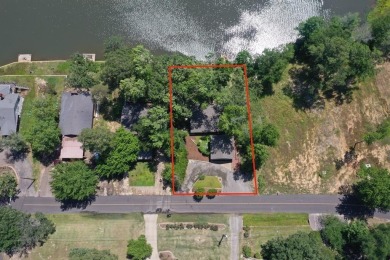 Welcome to a tranquil waterfront retreat nestled in the trees in on Hide-A-Way Lake Golf Course in Texas - for sale on GolfHomes.com, golf home, golf lot