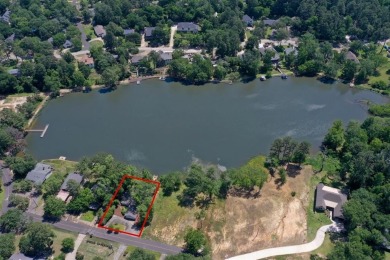Welcome to a tranquil waterfront retreat nestled in the trees in on Hide-A-Way Lake Golf Course in Texas - for sale on GolfHomes.com, golf home, golf lot