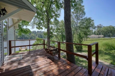Welcome to a tranquil waterfront retreat nestled in the trees in on Hide-A-Way Lake Golf Course in Texas - for sale on GolfHomes.com, golf home, golf lot