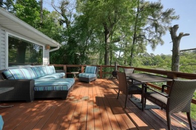Welcome to a tranquil waterfront retreat nestled in the trees in on Hide-A-Way Lake Golf Course in Texas - for sale on GolfHomes.com, golf home, golf lot