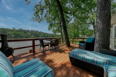 Welcome to a tranquil waterfront retreat nestled in the trees in on Hide-A-Way Lake Golf Course in Texas - for sale on GolfHomes.com, golf home, golf lot