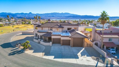 Experience luxury living in this beautiful 3-bedroom, 3-bathroom on London Bridge Golf Course in Arizona - for sale on GolfHomes.com, golf home, golf lot