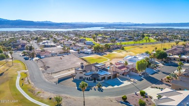 Experience luxury living in this beautiful 3-bedroom, 3-bathroom on London Bridge Golf Course in Arizona - for sale on GolfHomes.com, golf home, golf lot
