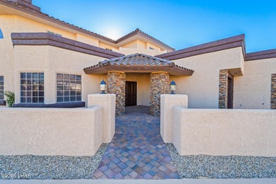 Experience luxury living in this beautiful 3-bedroom, 3-bathroom on London Bridge Golf Course in Arizona - for sale on GolfHomes.com, golf home, golf lot