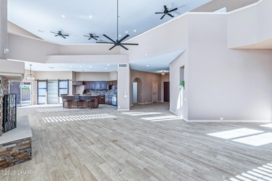 Experience luxury living in this beautiful 3-bedroom, 3-bathroom on London Bridge Golf Course in Arizona - for sale on GolfHomes.com, golf home, golf lot