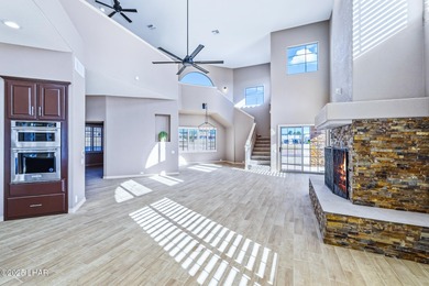 Experience luxury living in this beautiful 3-bedroom, 3-bathroom on London Bridge Golf Course in Arizona - for sale on GolfHomes.com, golf home, golf lot