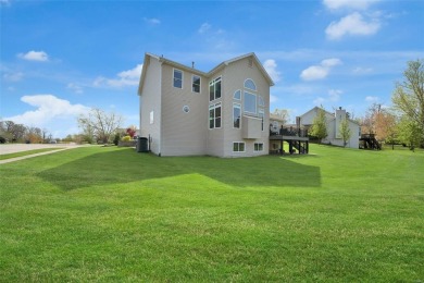 IMMACULATE inside & out, this updated 1.5-story has a on Bear Creek Golf Club in Missouri - for sale on GolfHomes.com, golf home, golf lot