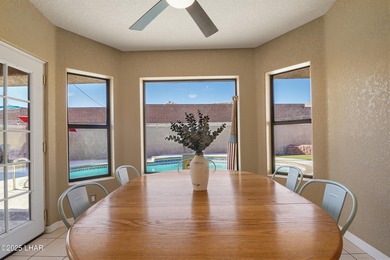 Welcome to your Havasu getaway-where lake views, golf course on London Bridge Golf Course in Arizona - for sale on GolfHomes.com, golf home, golf lot