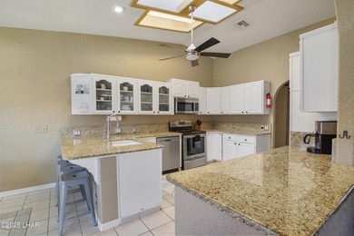 Welcome to your Havasu getaway-where lake views, golf course on London Bridge Golf Course in Arizona - for sale on GolfHomes.com, golf home, golf lot