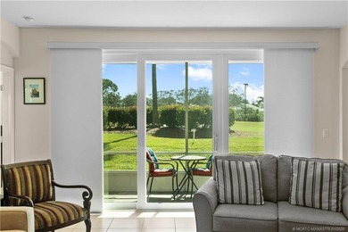 This beautifully renovated 1st-floor villa with golf course on Santa Lucia River Club in Florida - for sale on GolfHomes.com, golf home, golf lot