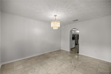 Welcome to this stunning 2-story pool home, offering 4 spacious on Citrus Springs Country Club in Florida - for sale on GolfHomes.com, golf home, golf lot