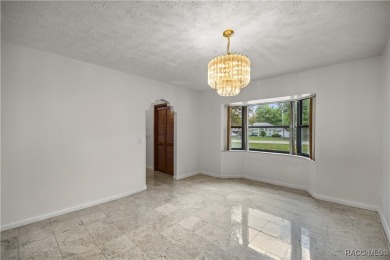 Welcome to this stunning 2-story pool home, offering 4 spacious on Citrus Springs Country Club in Florida - for sale on GolfHomes.com, golf home, golf lot