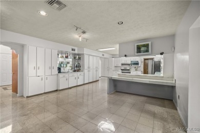 Welcome to this stunning 2-story pool home, offering 4 spacious on Citrus Springs Country Club in Florida - for sale on GolfHomes.com, golf home, golf lot