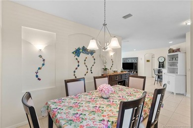 This beautifully renovated 1st-floor villa with golf course on Santa Lucia River Club in Florida - for sale on GolfHomes.com, golf home, golf lot