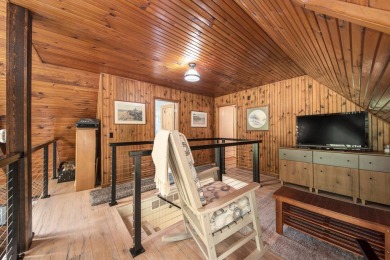 Welcome to your dream home with front-row views of the 5th hole on Canadian Lakes Country Club-The Highlands Course in Michigan - for sale on GolfHomes.com, golf home, golf lot