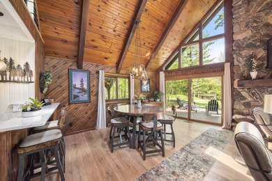 Welcome to your dream home with front-row views of the 5th hole on Canadian Lakes Country Club-The Highlands Course in Michigan - for sale on GolfHomes.com, golf home, golf lot