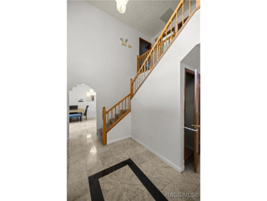 Welcome to this stunning 2-story pool home, offering 4 spacious on Citrus Springs Country Club in Florida - for sale on GolfHomes.com, golf home, golf lot