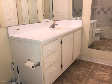 This 2 bedroom, 2 bathroom Third floor condo located close to on Gateway Golf and Country Club in Florida - for sale on GolfHomes.com, golf home, golf lot