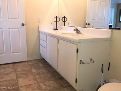 This 2 bedroom, 2 bathroom Third floor condo located close to on Gateway Golf and Country Club in Florida - for sale on GolfHomes.com, golf home, golf lot