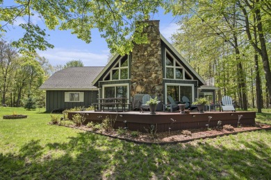 Welcome to your dream home with front-row views of the 5th hole on Canadian Lakes Country Club-The Highlands Course in Michigan - for sale on GolfHomes.com, golf home, golf lot
