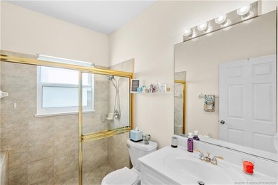 This beautifully renovated 1st-floor villa with golf course on Santa Lucia River Club in Florida - for sale on GolfHomes.com, golf home, golf lot