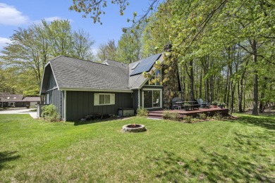Welcome to your dream home with front-row views of the 5th hole on Canadian Lakes Country Club-The Highlands Course in Michigan - for sale on GolfHomes.com, golf home, golf lot