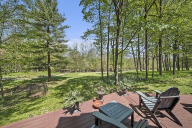 Welcome to your dream home with front-row views of the 5th hole on Canadian Lakes Country Club-The Highlands Course in Michigan - for sale on GolfHomes.com, golf home, golf lot