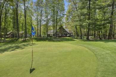 Welcome to your dream home with front-row views of the 5th hole on Canadian Lakes Country Club-The Highlands Course in Michigan - for sale on GolfHomes.com, golf home, golf lot