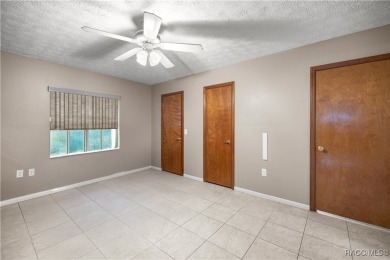 Welcome to this stunning 2-story pool home, offering 4 spacious on Citrus Springs Country Club in Florida - for sale on GolfHomes.com, golf home, golf lot