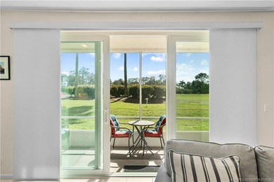 This beautifully renovated 1st-floor villa with golf course on Santa Lucia River Club in Florida - for sale on GolfHomes.com, golf home, golf lot