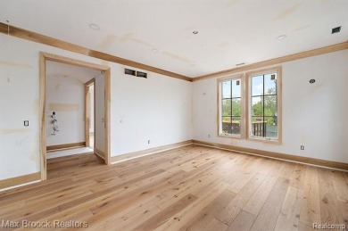 Discover a rare opportunity to own a custom-built residence on Birmingham Country Club in Michigan - for sale on GolfHomes.com, golf home, golf lot