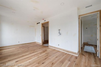 Discover a rare opportunity to own a custom-built residence on Birmingham Country Club in Michigan - for sale on GolfHomes.com, golf home, golf lot