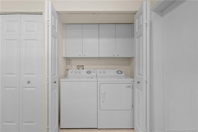 This beautifully renovated 1st-floor villa with golf course on Santa Lucia River Club in Florida - for sale on GolfHomes.com, golf home, golf lot