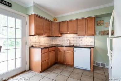 Welcome to this charming Royal Oak bungalow featuring three on Red Run Golf Club in Michigan - for sale on GolfHomes.com, golf home, golf lot