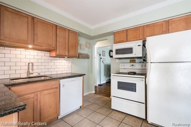 Welcome to this charming Royal Oak bungalow featuring three on Red Run Golf Club in Michigan - for sale on GolfHomes.com, golf home, golf lot